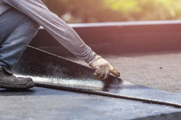 Professional Emergency Waterproofing technician working in Wheeling, IL